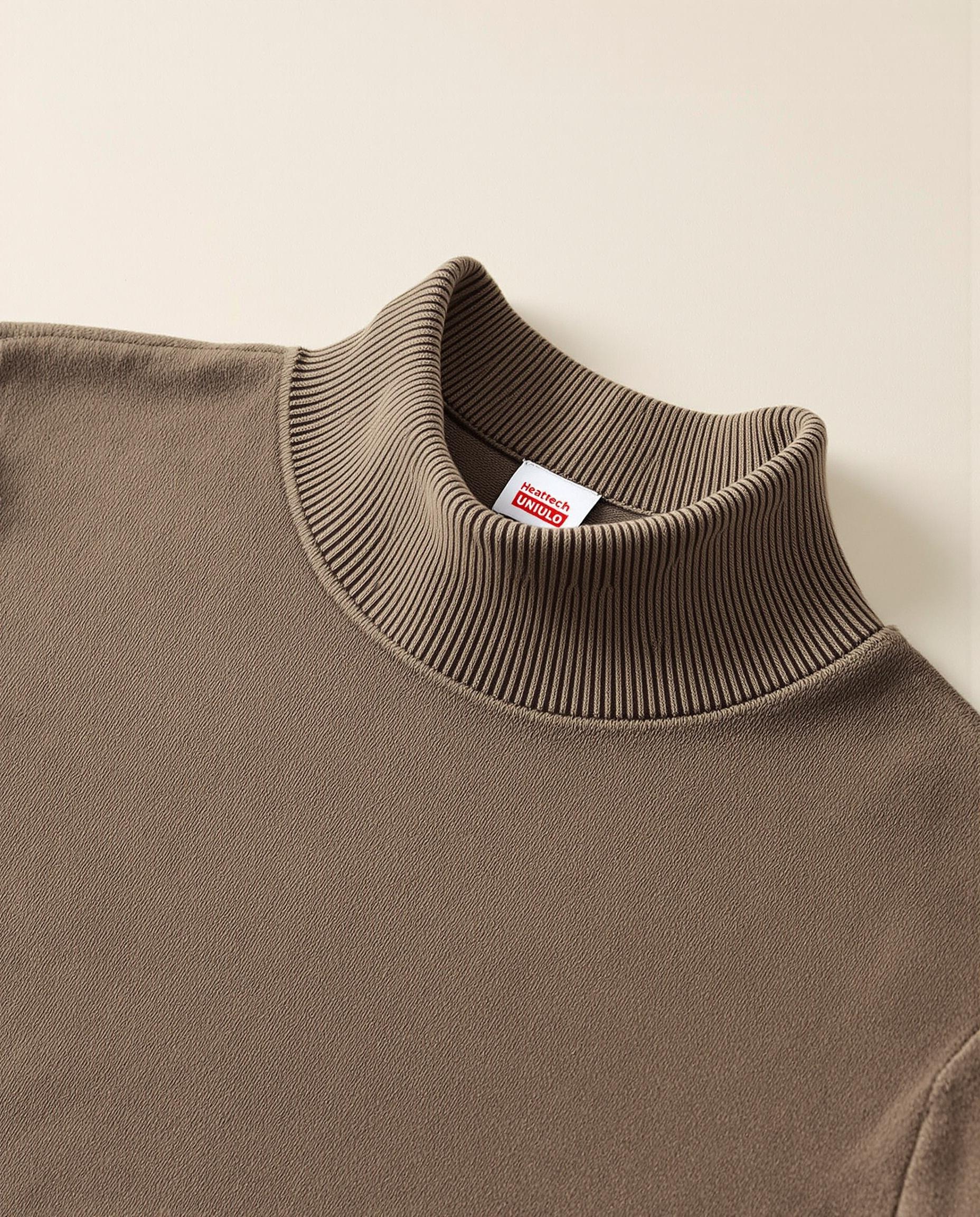 Sous-pull thermique en laine mérinos avec étiquette Heattech UNIQLO visible